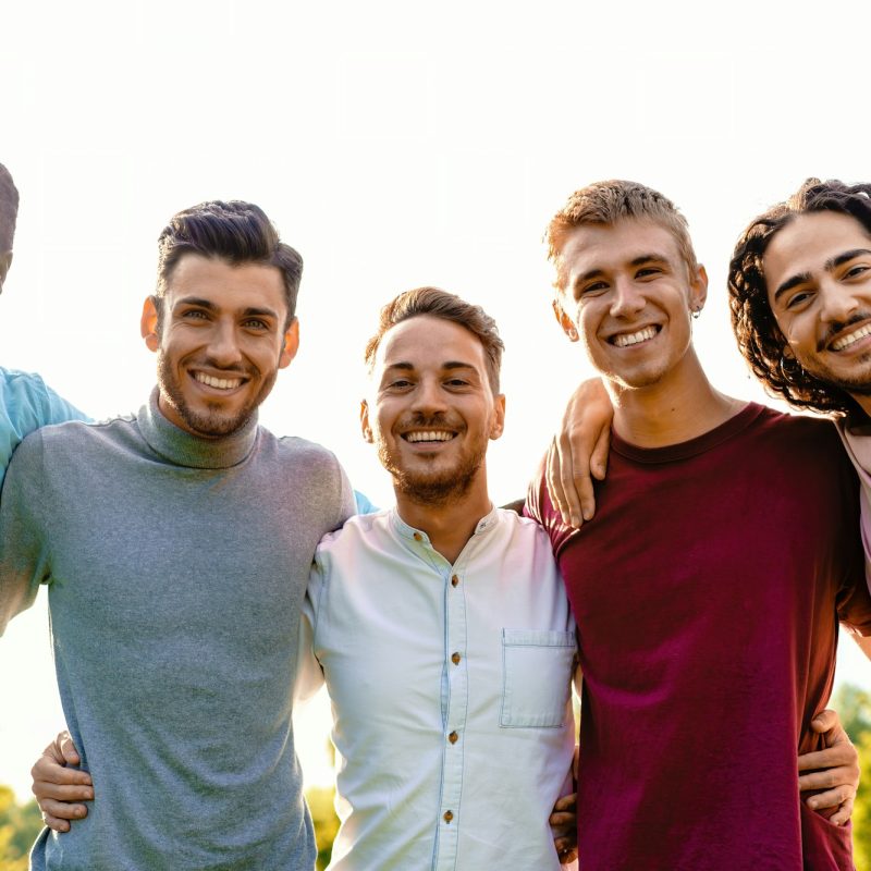 Brotherhood Embrace: Multiracial Group of Friends Smiling