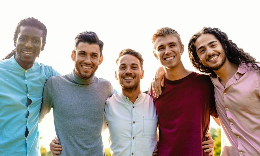 Brotherhood Embrace: Multiracial Group of Friends Smiling